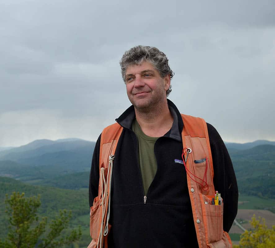 Click to explore how Alan Calfee sustainably manages over 25,000 acres of woodland by creating and maintaining diverse forest ecosystems for long-term health.